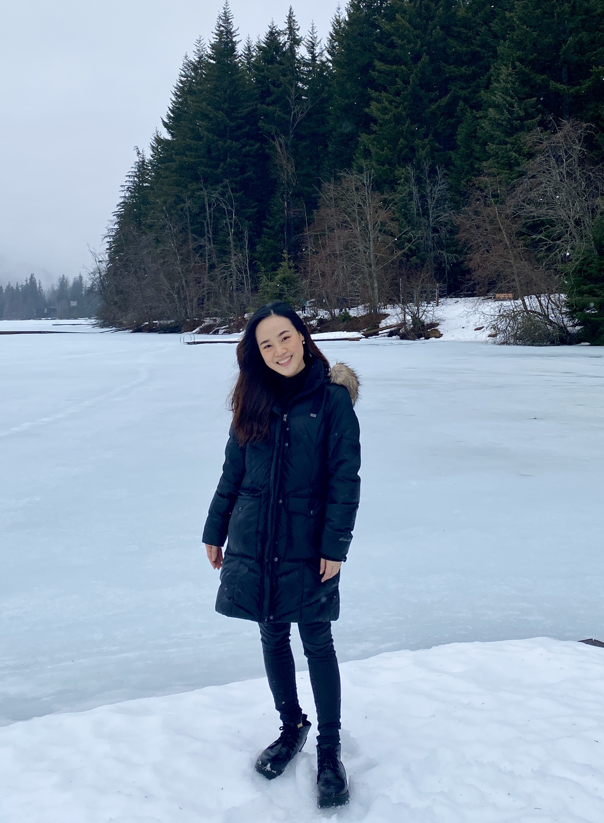 UBC MBA student Cat Aramwongtrakul enjoys a lakeside walk on a day-trip to Whistler 